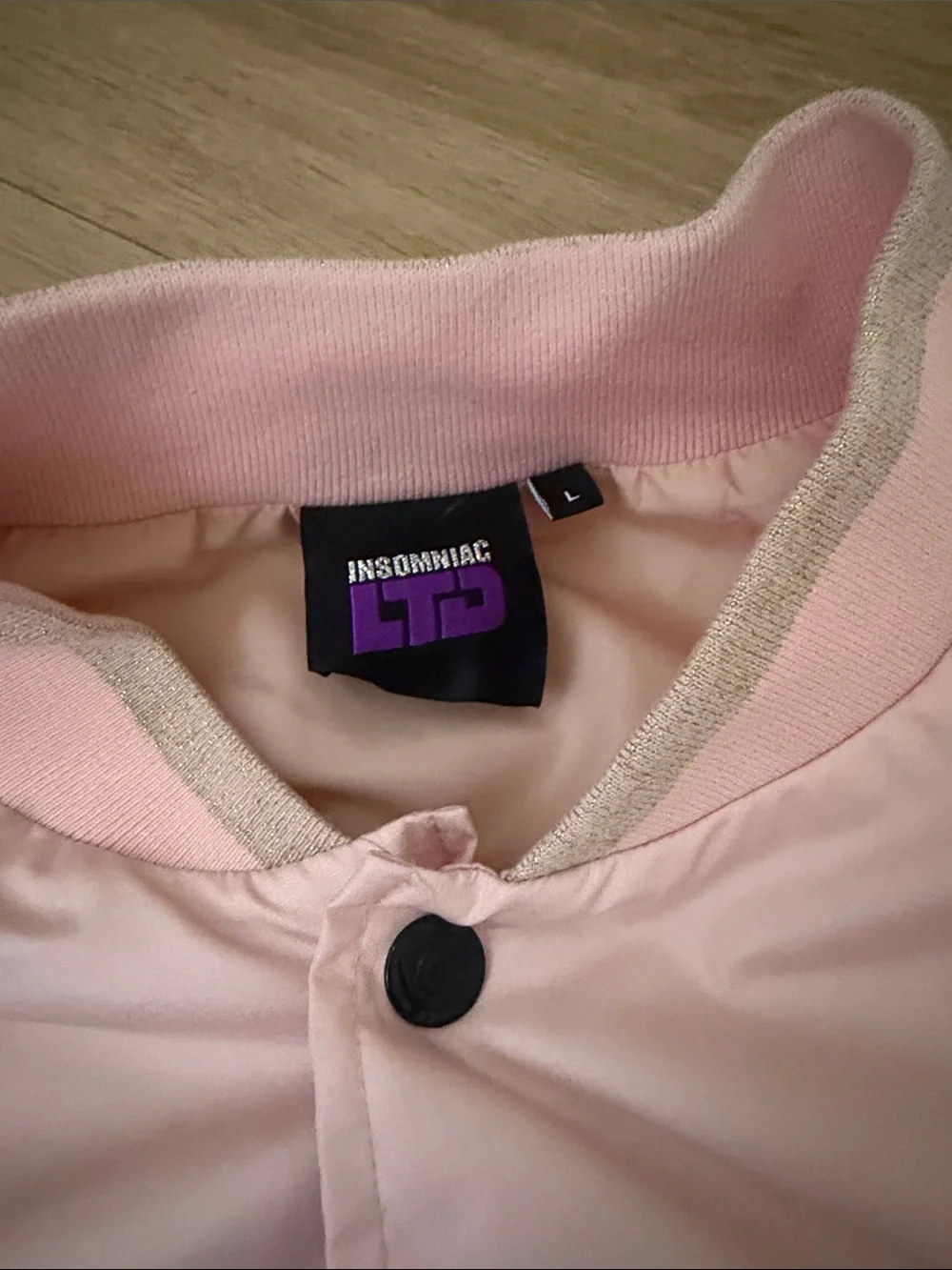 Insomniac LTD Audio Playback Light Pink Bomber Jacket with Embroidered Logo